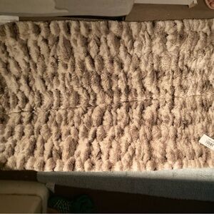 SOLD. ABYSS area rugs.. Washable, soft and very attractive!